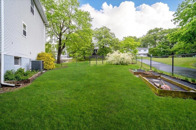 7 Cambridge Cir, Monroe, NY 10950 - view of yard with a garden and central AC