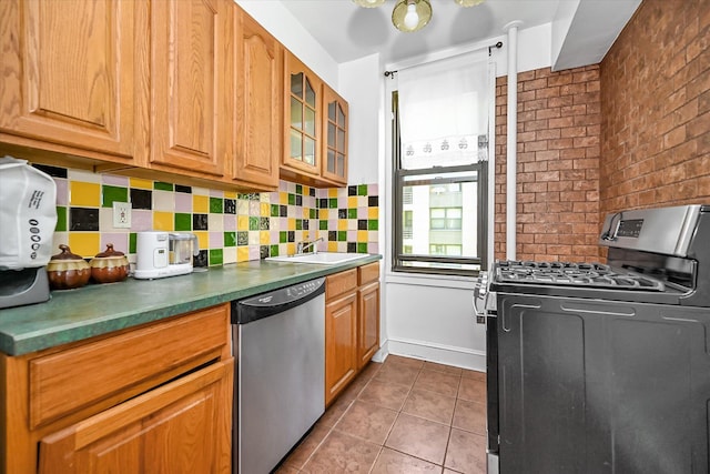 98-51 64th Ave Unit 2C, Rego Park, NY 11374 - kitchen with stainless steel appliances, tile patterned flooring, decorative backsplash, glass insert cabinets, and a sink