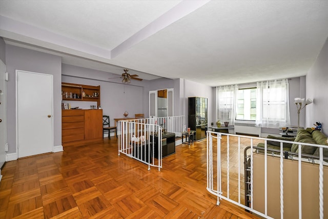 98-51 64th Ave Unit 2C, Rego Park, NY 11374 - kitchen featuring radiator heating unit and ceiling fan