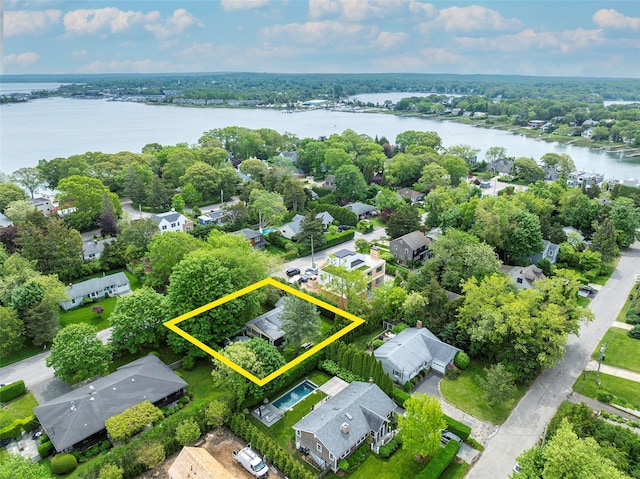 31 Sunset Dr, Sag Harbor, NY 11963 - aerial perspective of suburban area featuring a large body of water and property parcel outlined