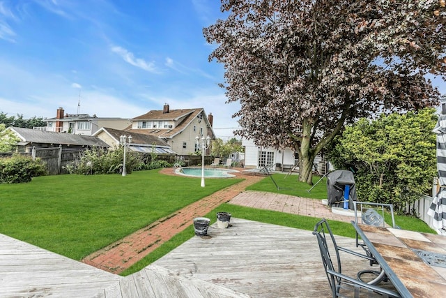 view of yard with a wooden deck