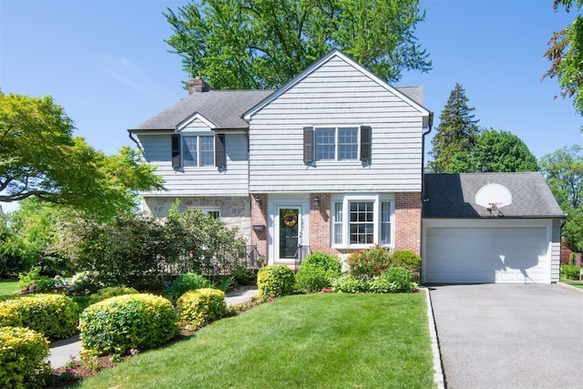 953 Peace St, Pelham, NY 10803 - view of front of house with a garage, asphalt driveway, a front lawn, a chimney, and roof with shingles
