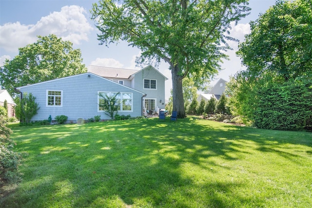 953 Peace St, Pelham, NY 10803 - rear view of property featuring a lawn