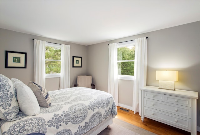 493 Water Mill Towd Rd, Southampton, NY 11968 - bedroom with wood finished floors