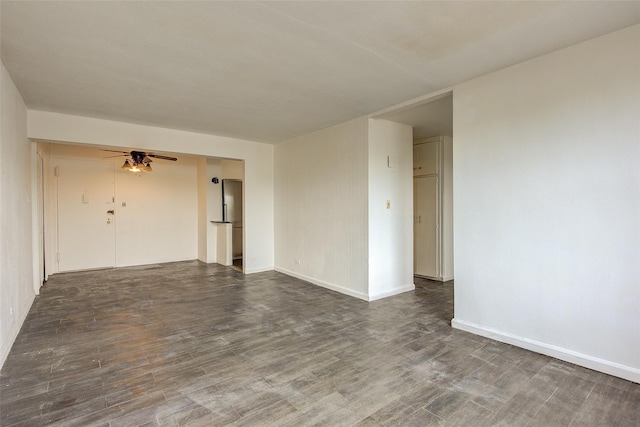 3901 Nostrand Ave Unit 3T, Brooklyn, NY 11235 - empty room featuring dark wood-style floors, a ceiling fan, and baseboards