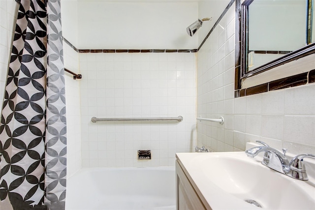 3901 Nostrand Ave Unit 3T, Brooklyn, NY 11235 - full bath with vanity, shower / bath combo, and tile walls