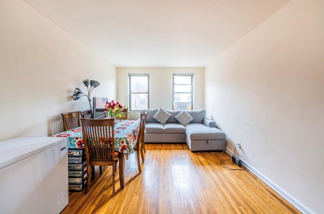 215-43 48th Ave Unit 3A, Bayside, NY 11364 - dining area featuring light wood-style floors