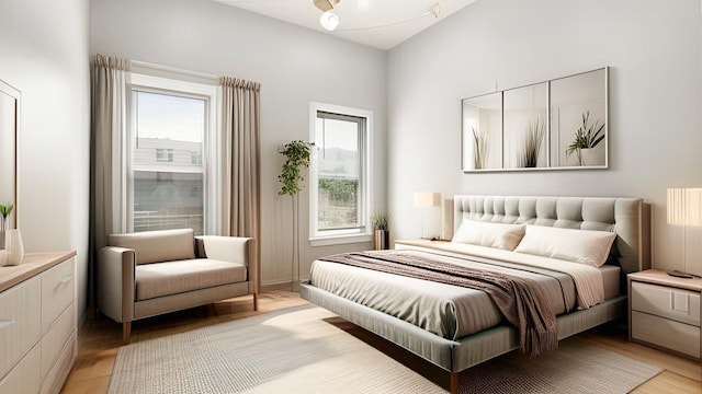 506 E 183rd St, Bronx, NY 10458 - bedroom featuring multiple windows and light wood-style floors