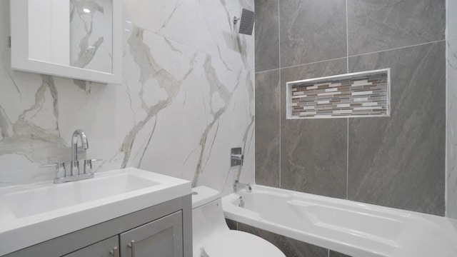 506 E 183rd St, Bronx, NY 10458 - full bath featuring tile walls, vanity, toilet, and tiled shower / bath