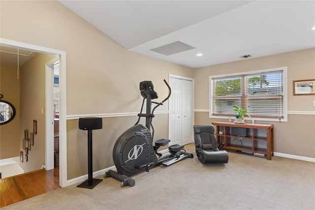 exercise room with baseboards, carpet floors, attic access, and recessed lighting