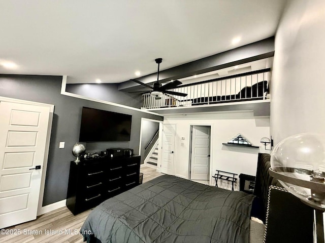 bedroom featuring light wood-style flooring, recessed lighting, and baseboards