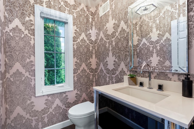 3 Briar Close Rd, Larchmont, NY 10538 - bathroom with vanity, toilet, baseboards, and wallpapered walls