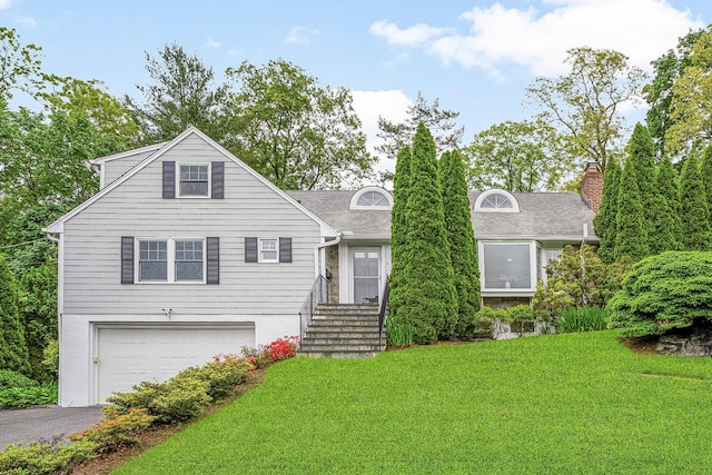 3 Briar Close Rd, Larchmont, NY 10538 - view of front of house featuring driveway, a front yard, an attached garage, and a chimney