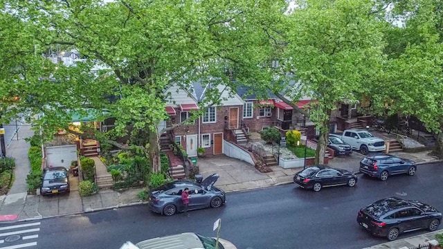 455 E 40th St, Brooklyn, NY 11203 - view of asphalt street with stairway, curbs, and sidewalks
