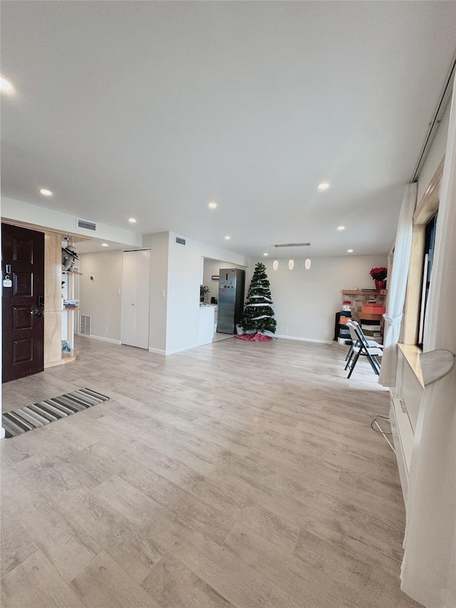 524 115th St Unit 524C, Flushing, NY 11356 - unfurnished living room featuring recessed lighting and light wood-style flooring