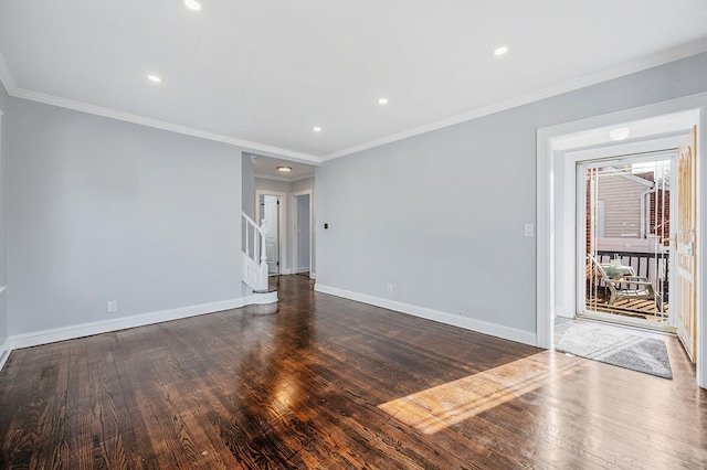unfurnished room with baseboards, wood finished floors, stairs, recessed lighting, and ornamental molding