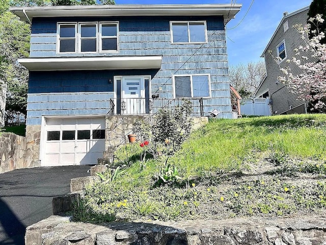 102 Maple St, Croton-On-Hudson, NY 10520 - view of front of property featuring a garage