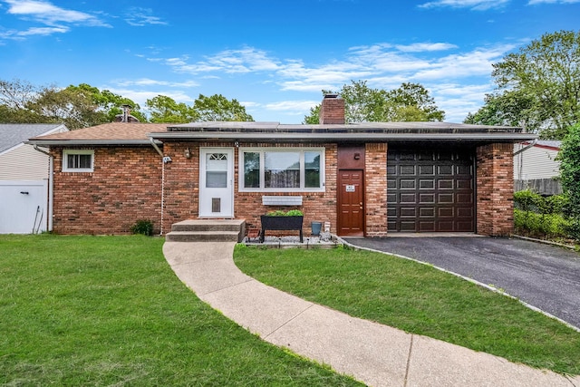 1129 Bay Shore Ave, Bay Shore, NY 11706 - ranch-style house with brick siding, a garage, driveway, a chimney, and a front lawn