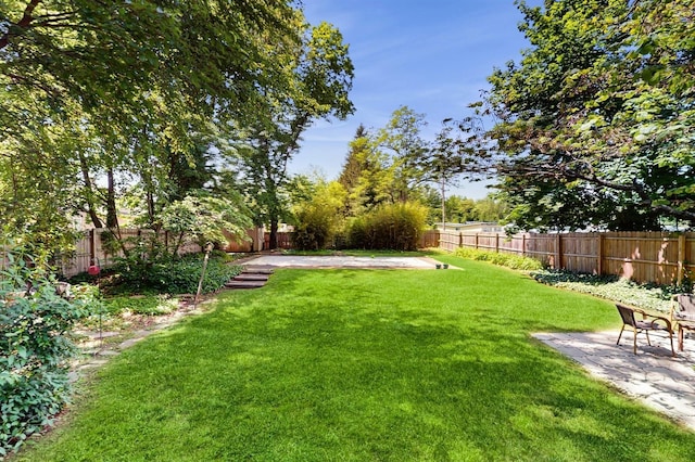 98 Jackson St, Fishkill, NY 12524 - fenced backyard with a patio