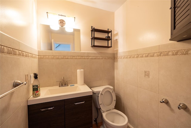 21 Pine Cone St, Middle Island, NY 11953 - half bath featuring tile walls, toilet, vanity, and a wainscoted wall