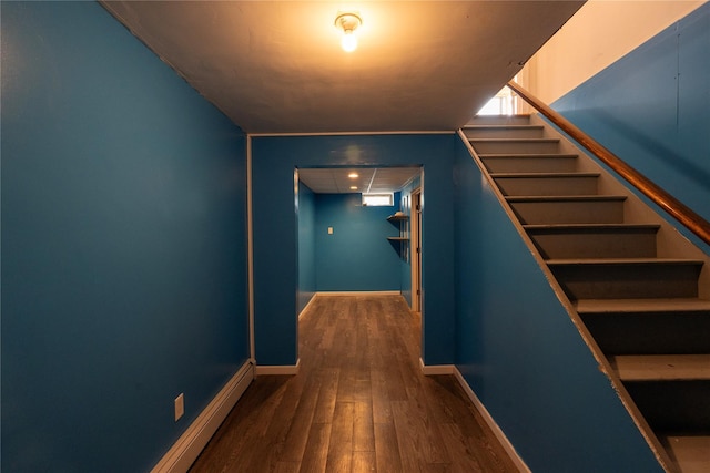 21 Pine Cone St, Middle Island, NY 11953 - corridor featuring wood finished floors, baseboards, and stairs