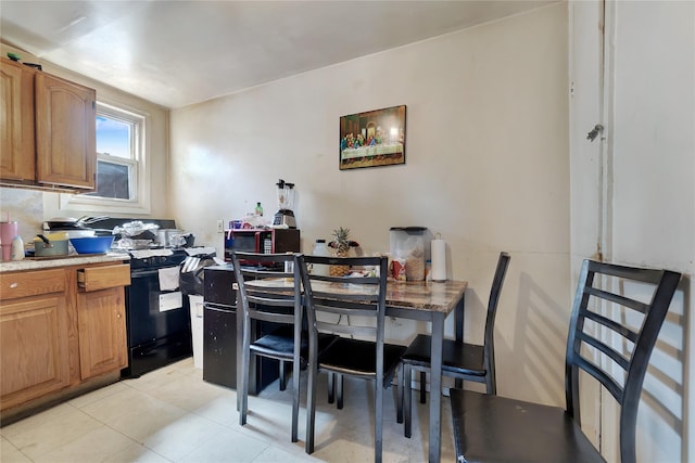 101 Baldwin Rd, Hempstead, NY 11550 - dining room with light tile patterned floors