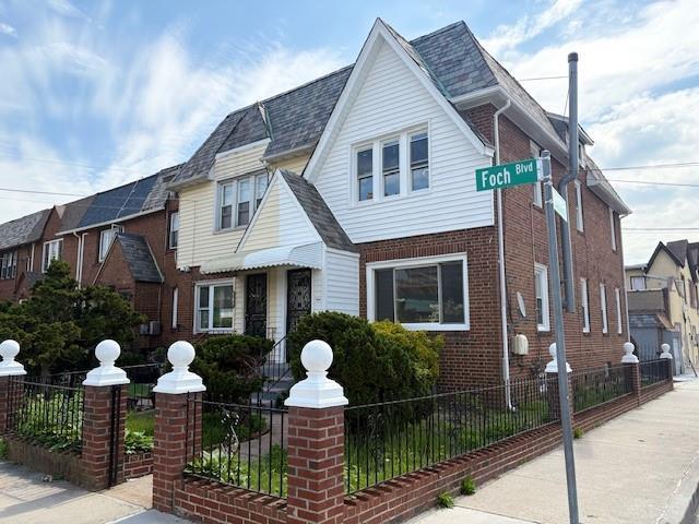 187-02 Foch Blvd, Saint Albans, NY 11412 - view of front facade with brick siding