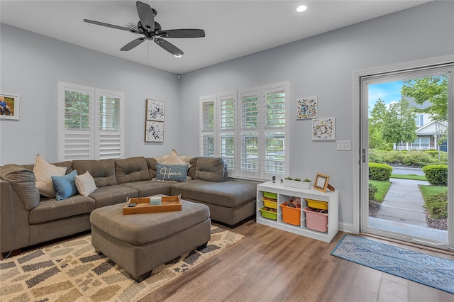 27 Lager Ln, Patchogue, NY 11772 - living room with plenty of natural light, light wood-type flooring, ceiling fan, recessed lighting, and baseboards