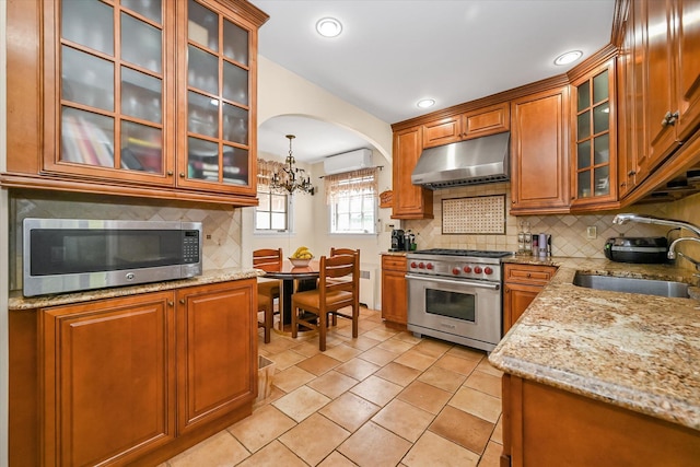 182-04 80th Dr, Jamaica Estates, NY 11432 - kitchen featuring under cabinet range hood, appliances with stainless steel finishes, a sink, tasteful backsplash, and recessed lighting