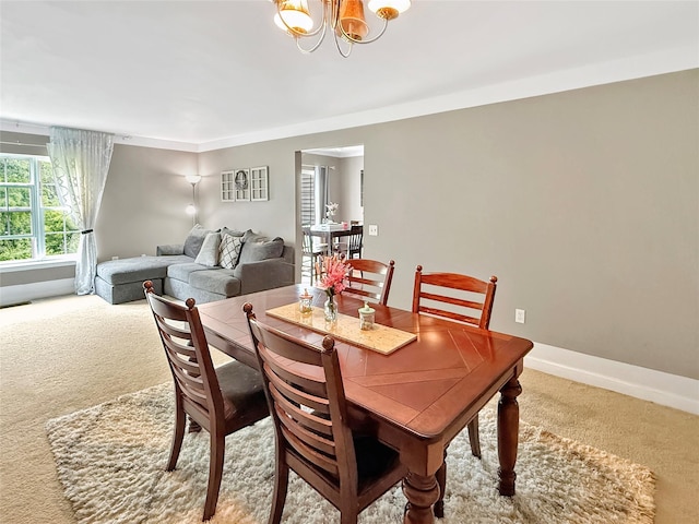5705 Boulder Way, Wappingers Falls, NY 12590 - dining room featuring carpet flooring, a chandelier, and baseboards