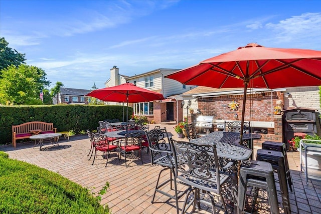 2957 214th Pl, Bayside, NY 11360 - view of patio with an outdoor kitchen, outdoor dining area, and grilling area