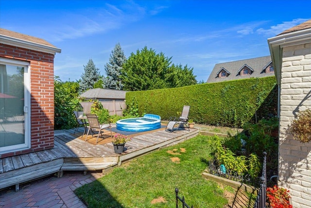 2957 214th Pl, Bayside, NY 11360 - fenced backyard with a deck
