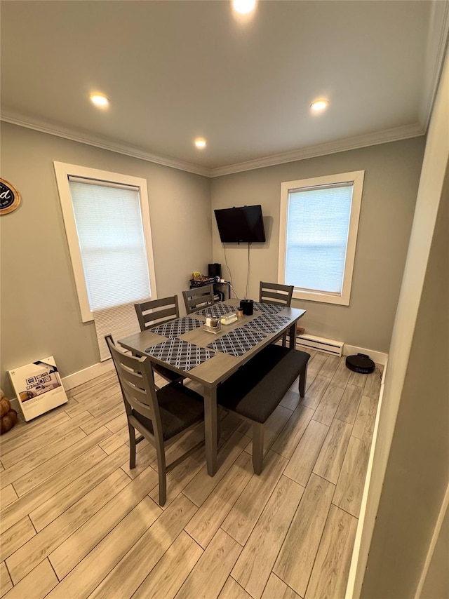 dining room featuring light wood-style floors, crown molding, a baseboard radiator, recessed lighting, and baseboards