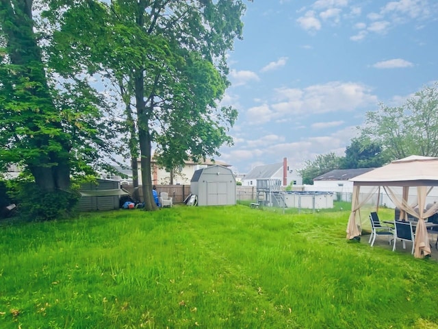 131 E Alhambra Ave, Lindenhurst, NY 11757 - view of yard featuring a gazebo and an outdoor pool