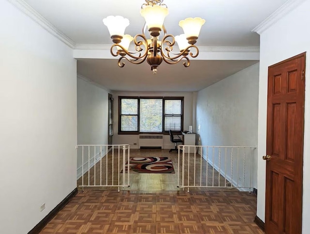 corridor with radiator heating unit, an upstairs landing, a chandelier, ornamental molding, and baseboards