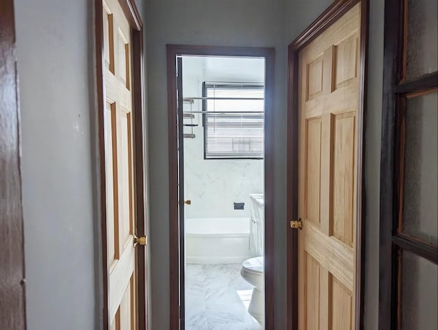 entryway featuring marble look tile flooring