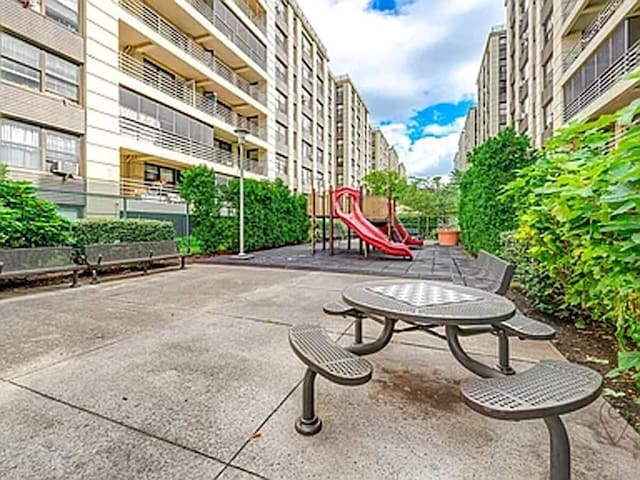 view of property's community with a patio area