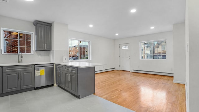 907 Clarence Ave, Bronx, NY 10465 - kitchen with dishwasher, a baseboard radiator, gray cabinetry, a sink, and recessed lighting