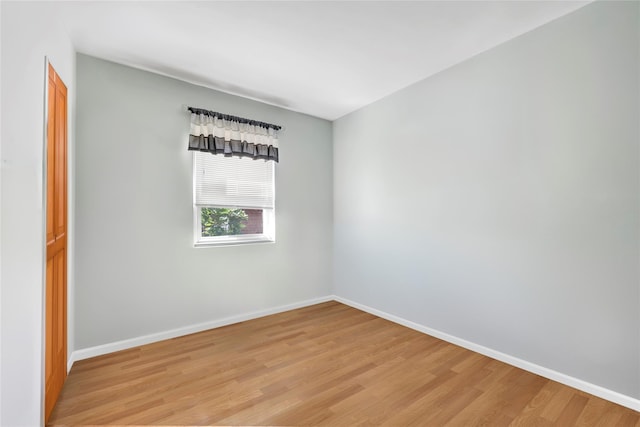151-84 17th Rd, Whitestone, NY 11357 - spare room with light wood finished floors and baseboards