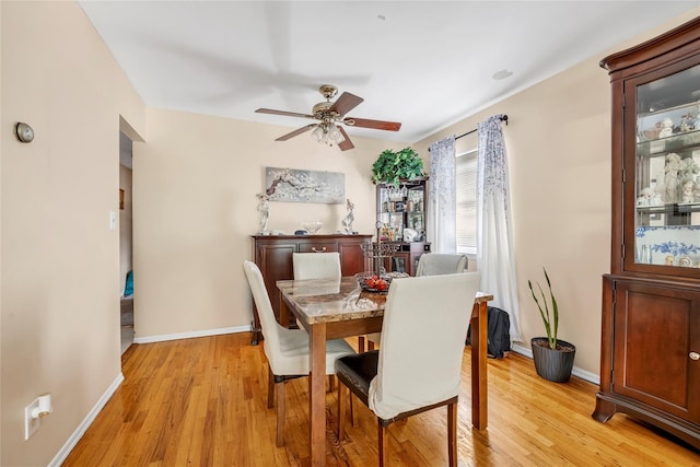 151-84 17th Rd, Whitestone, NY 11357 - dining room with a ceiling fan, light wood-type flooring, and baseboards