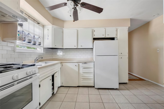 151-84 17th Rd, Whitestone, NY 11357 - kitchen with white appliances, under cabinet range hood, tasteful backsplash, a ceiling fan, and white cabinetry