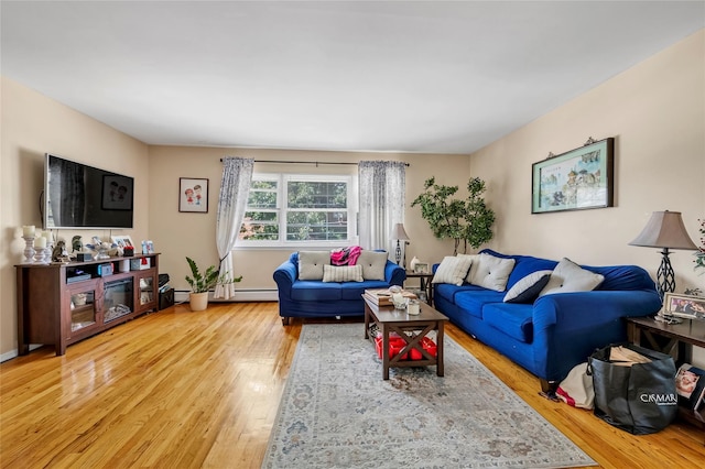 151-84 17th Rd, Whitestone, NY 11357 - living area with wood finished floors and a baseboard radiator