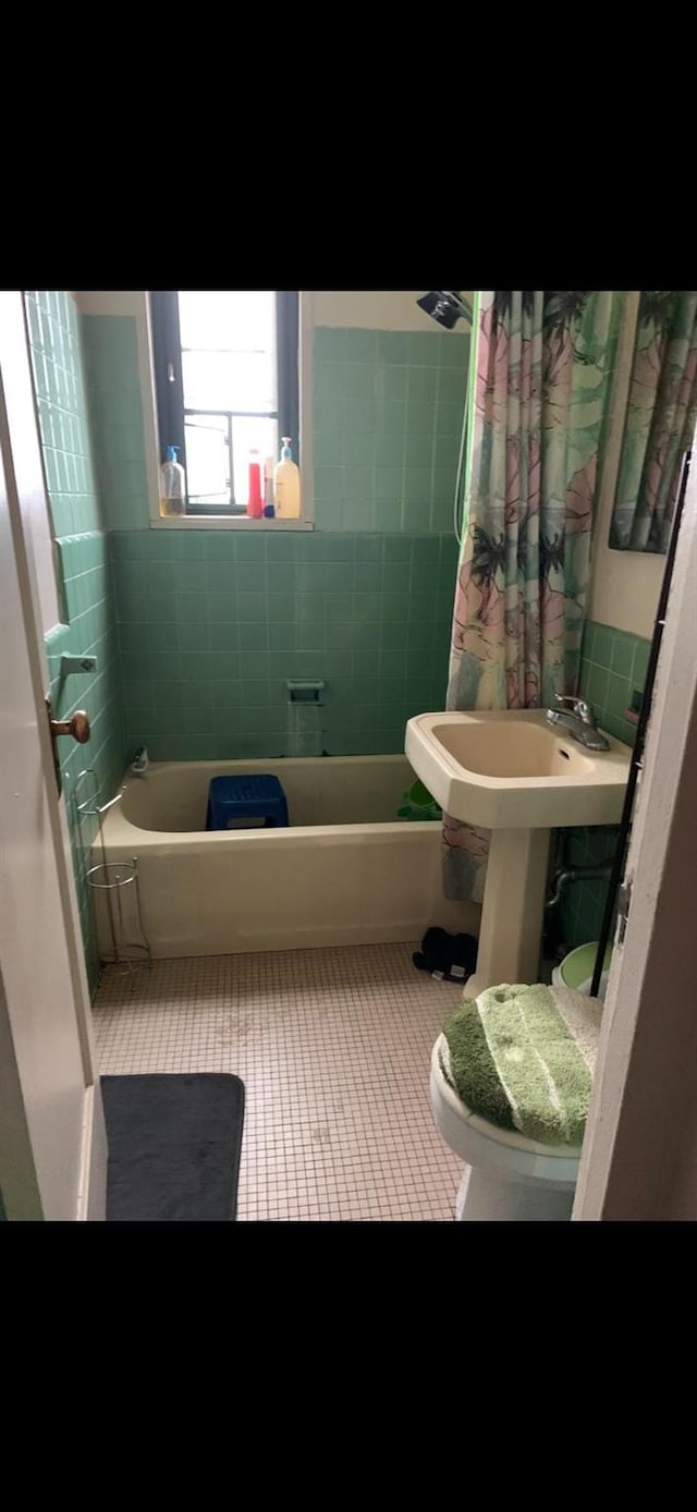 1314 Virginia Ave Unit 5A, Bronx, NY 10462 - bathroom with tile patterned floors, shower / bathtub combination with curtain, and toilet