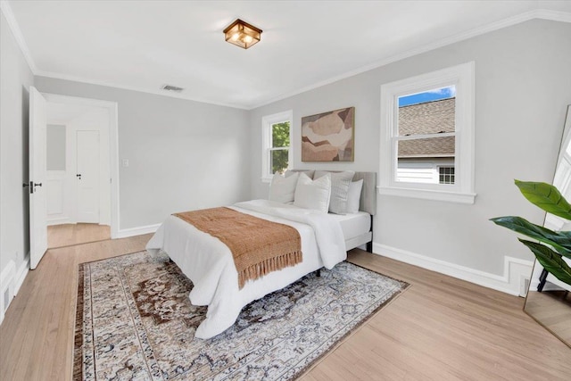 6 Mcbride Ave, White Plains, NY 10603 - bedroom with light wood-style floors, crown molding, and baseboards