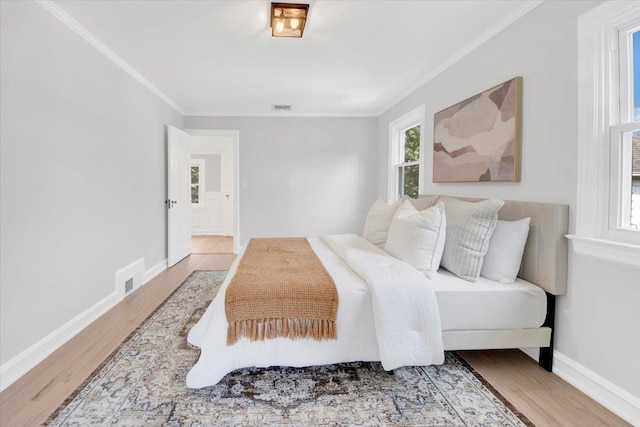 6 Mcbride Ave, White Plains, NY 10603 - bedroom with wood finished floors, crown molding, and baseboards