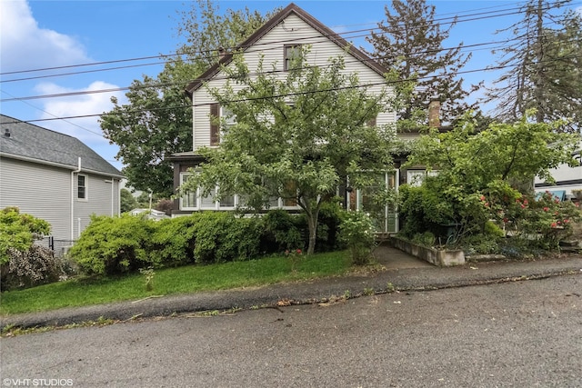 24 John St, Beacon, NY 12508 - view of property hidden behind natural elements