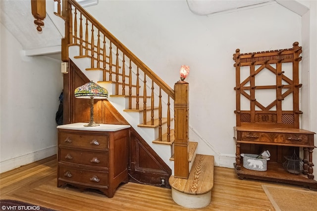 24 John St, Beacon, NY 12508 - staircase with wood finished floors and baseboards