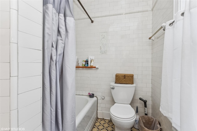 24 John St, Beacon, NY 12508 - bathroom featuring toilet, tile walls, and shower / tub combo with curtain