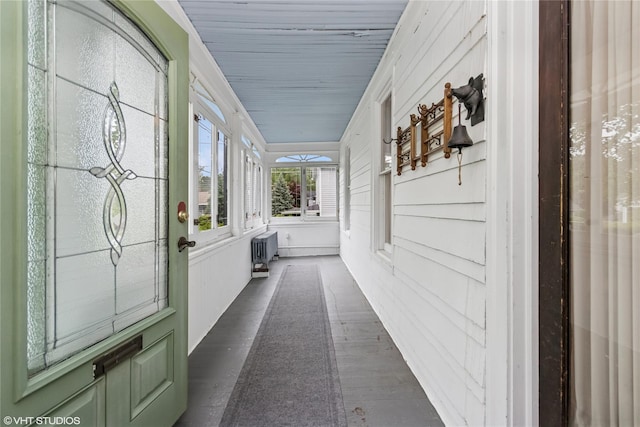 24 John St, Beacon, NY 12508 - hall with radiator and dark wood-style floors
