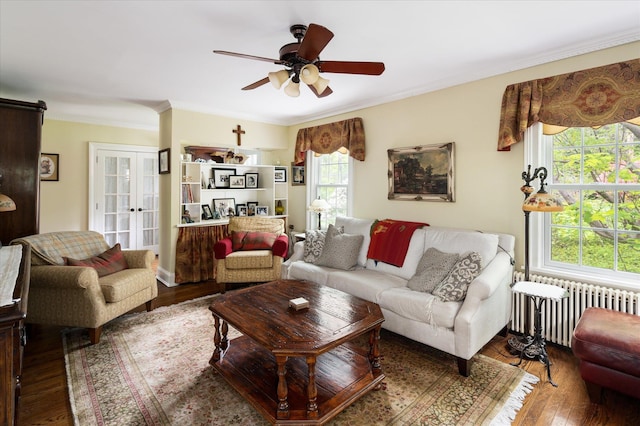 41 Granite Springs Rd, Granite Springs, NY 10527 - living room featuring radiator, hardwood / wood-style flooring, ornamental molding, a ceiling fan, and french doors